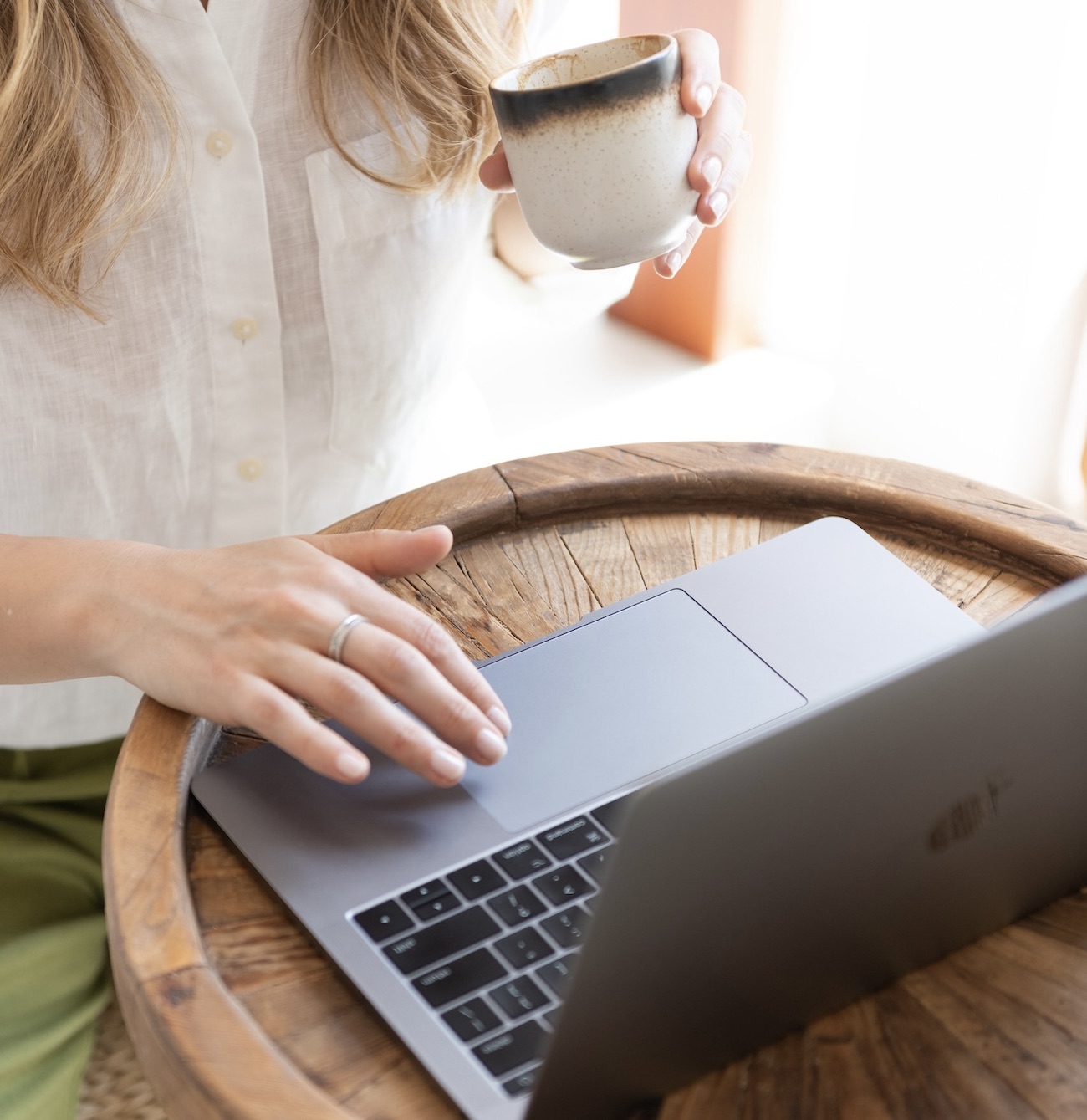 Working at a table with a coffee