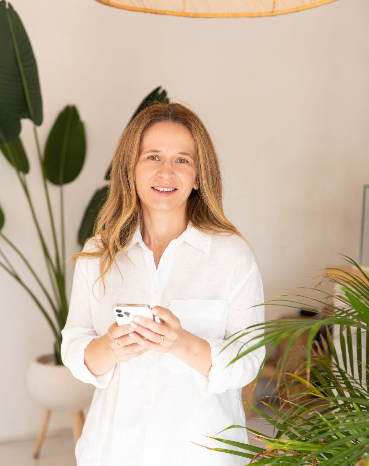 Iuliana Cotocel at home with a cup of coffee